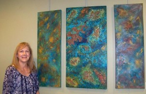 JoAnne Laudolff with one of her Oil and Cold Wax works