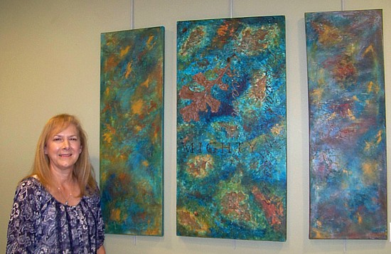 JoAnne Laudloff with one of her Oil and Cold Wax works